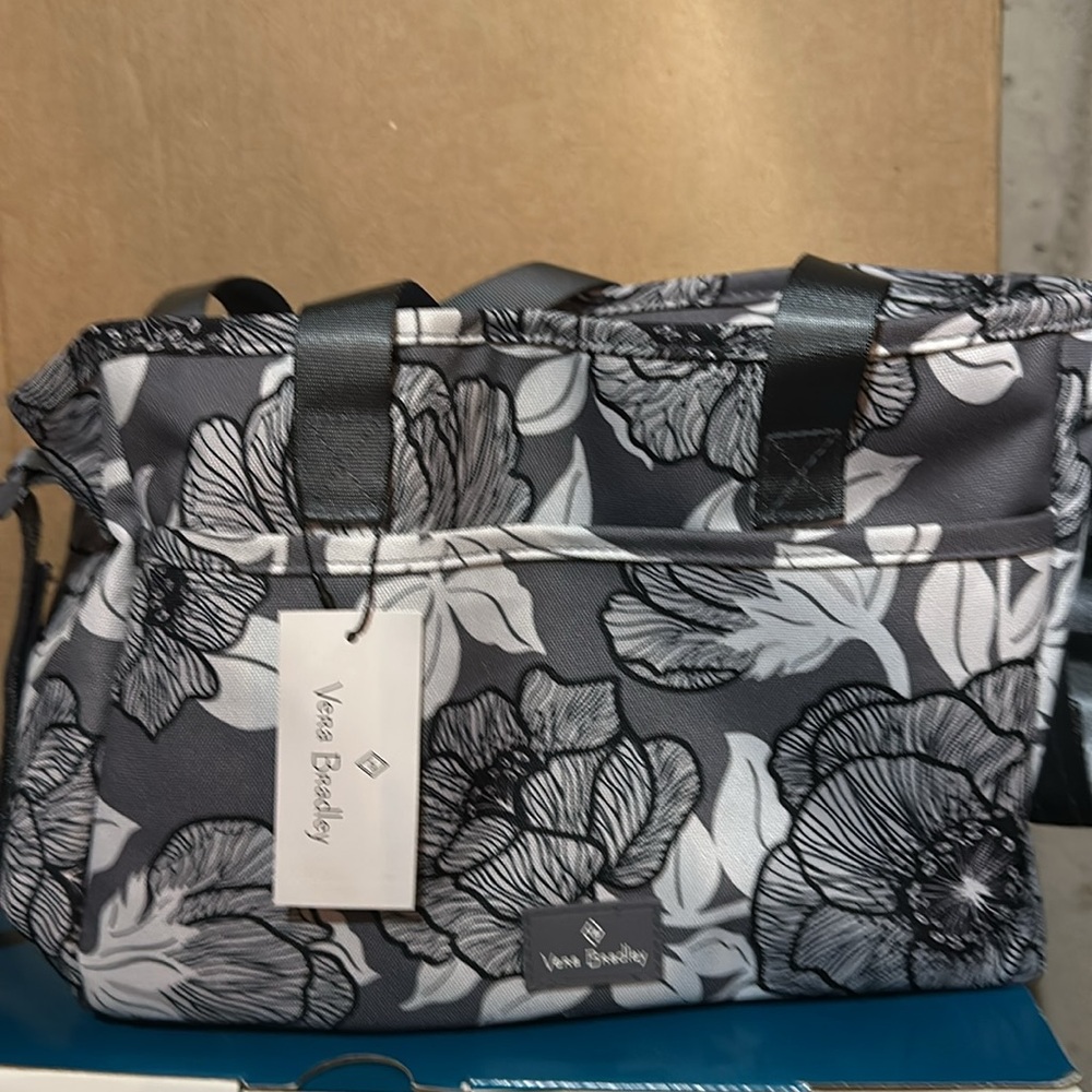 Vera Bradley bag. 4 pockets inside, 1 outside. Never used. Black grey & white.